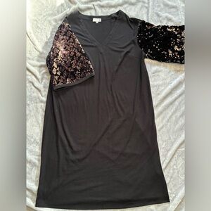 Super cute sequenced sleeve dress.